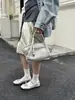 2026 Verano Estilo Coreano Diseño de Nicho Bolso de Mano de Piel de Vaca Bolso Dumpling Bolso Cruzado de Hombro de Cuero Genuino Bolso Cruzado de Moda para Mujer Transfronterizo