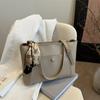 Bolsa Tote de Moda Retrô Feminina 2025 Nova Trabalho Deslocamento Bolsa de Axila Design Nicho High-End Mais Fácil para Combinar Bolsa Feminina