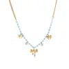 Collar de cuentas azules para mujer con un colgante de corazón y mariposa dorados, cadena para la clavícula con un diseño único que no se decolora