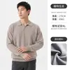 Nueva colección de otoño e invierno: Suéter tipo polo de punto para hombre con cuello, con un diseño clásico y discreto en colores lisos, perfecto como capa base de manga larga para el trabajo o el uso diario.