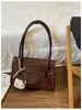 Bolsa de mano estilo retro, de alta gama, gran capacidad para mujer, nueva colección 2025, moderna y única, adecuada para ir al trabajo