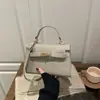 Moda Simple y Fresca de Primavera 2026 Bolso Pequeño Cuadrado Diseño Nicho Coreano Bolso de Hombro Cruzado Texturizado