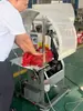 Correa de extremo de ropa acolchada de algodón empacadora máquina de atado de apriete por presión neumática máquina de atado de ropa de algodón con cuerda de hierba de plástico