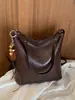 Bolso de hombro de diseño de nicho estilo coreano transfronterizo, moda retro para el día a día, para mujer, color liso, moderno, casual, bandolera tipo cubo