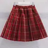 Roupas Infantis para Meninas Conjunto de Suéter Outono e Inverno 2026 Novo Estiloso Saia Plissada Vermelha Infantil Conjunto de Duas Peças de Ano Novo