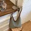 Bolsa de ombro tecida estilosa e fashion de Shuai Mi, bolsa tote vintage de grande capacidade, bolsa de axila leve única de grande capacidade