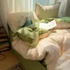 2026 Nueva Serie Explosiva de Punto Triángulo Algodón Ultra Suave Tipo Hilo Esponjoso Juego de Cuatro Piezas Temporada Estudiantil Juego de Cama de Tres Piezas