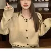Abrigo minimalista de color liso estilo coreano con cuello redondo, nuevo top de punto de manga larga con cordón para otoño e invierno 2026 para mujer, cárdigan