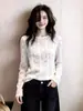 Blusa Branca de Renda Patchwork Manga Longa Estilo Romântico Francês Primavera 2026 Feminina de Alta Qualidade Solta Jovem Camisa de Renda