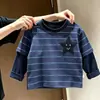 Camiseta de rayas con bordado de estrella para niños, estilo coreano, súper elegante, top pullover versátil de cuello redondo para bebés y niños pequeños