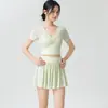 Conjunto de yoga de malla retorcida de manga corta para mujer, minifalda plisada de cintura alta, conjunto de dos piezas de secado rápido para fitness y danza