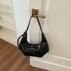 Bolso de axila de nicho estilo coreano de alta costura nuevo para mujer 2026, elegante bolso de hombro de cuero suave, bolso cruzado versátil y elegante