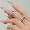 Juego de Anillos Apilables de Zirconia con Diamantes Acero Inoxidable Chapado en Oro de 18K Anillo con Colgante de Candado Pequeño Joyería de Mano para Mujer Estilo Europeo y Americano Venta al por Mayor