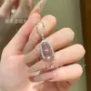 Venta al por mayor del fabricante Xiaohongshu Colgante de Frijol Natural de Espuma de Agua Jade Dos Secciones con Incrustación de Plata S925, Diseño Fresco y Delicado