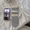 Meias cinzas femininas outono inverno meias de algodão estilo japonês renda meias de cano médio laço sem costura estampa floral borda enrolada meias folgadas