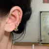 Pendientes de acero de titanio 316L en la colección café dorado claro, ear cuffs minimalistas de circonita, pendientes de alta gama personalizados con forma de corazón para mujer, lujo ligero