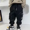 Pantalones de Bolsillo Tridimensionales para Niños Primavera y Otoño 2026 Nuevo Estilo Coreano Pantalones Cargo Sueltos Elegantes para Niños Pantalones Modernos para Bebé