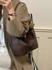 Nueva bolsa para dumplings de gran capacidad en color macarrón para mujer, nuevo estilo principios de primavera 2026, bolso de hombro y bandolera elegante y versátil