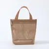 Bolsa de mamá, bolso de mano, neceser, bolsa de almacenamiento, bolsa multiusos de viaje de malla hueca, estilo ins japonés y coreano
