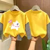 Linda camiseta básica de manga larga para niñas, colección primavera/otoño 2026, camiseta elegante de cuello redondo, algodón puro, aspecto en capas, para niños de talla mediana y grande