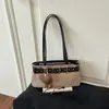 Bolsa feminina transfronteiriça de camurça de grande capacidade, nova bolsa versátil para ombro/axila outono 2026, bolsa de mão vintage para o dia a dia