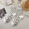 Calcetines de encaje Lolita dulce japoneses para mujer calcetines de algodón fabricantes al por mayor primavera y verano calcetines de tubo medio con lazo corte jk color sólido