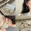 Pendientes de Aro Doble Grandes Exagerados de Metal de Alta Calidad de Lujo Ligero Europeo y Americano Diseño de Nicho Elegantes Pendientes Elegantes Versátiles