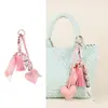 Pingente de Bolsa Cachecol em Forma de Coração Transfronteiriço, Acessório de Bolsa Fashion com Franja de Couro de Alta Qualidade Estilo Ins