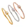 Lujo estilo europeo y americano, pulseras de resorte de diamantes completos, pulseras de bola giratoria incrustadas con diamantes, chapadas en oro, venta al por mayor para ventas transfronterizas