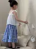 Vestido de tirantes estilo chica dulce japonés nuevo para Primavera/Verano 2026 con lazo y conjunto de pantalones de cuadros azules