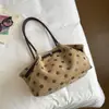 Bolsa de axila chique de nicho estilo coreano para mulheres, nova bolsa de ombro super popular com poá 2026, bolsa estilosa da moda
