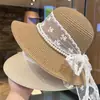 Sombrero de paja con lazo de encaje de perlas estilo francés para mujer, nuevo sombrero de paja para vacaciones de verano en la playa y el mar, protección solar