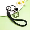Llavero Acrílico de Estrella de Cinco Puntas con Cordón Color Caramelo Encanto para Estuche de Auriculares Decoración Fresca para Empaque de Bolsas de Pareja
