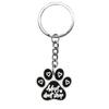 Bonito desenho animado cachorro pata impressão pingente bolsa pingente chaveiro decoração DIY chave acessórios pequenas joias atacado