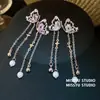Pendientes elegantes y gráciles de mariposa, gota de agua, circonita y perla, pendientes de diseño nicho, pendientes de lujo ligero y alta gama