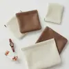 2025 Nuevo Cierre Automático Almacenamiento de Resorte Tesoro Portátil Mini Multifuncional Bolsa Pequeña para Artículos Varios Auriculares Llave