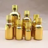 Botella de vidrio dorada galvanizada 5ml10ml multi-especificación botella cosmética de vidrio botella de aceite esencial de vidrio fabricantes al por mayor
