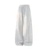 Pantalones deportivos bordados de corte curvo estilo americano para hombre, con diseño holgado de pierna ancha, ajuste relajado y silueta de pierna recta, perfectos para el otoño