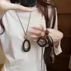 Collar Colgante Anillo Vintage Nuevo 2026 para Mujer, Cadena Larga de Suéter de Lujo de Alta Gama, Accesorio para el Cuello
