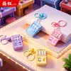 Colgante de tragamonedas de dibujos animados de macarrón, juguete portátil para aliviar el estrés, juguete para niños, premio de jardín de infantes, regalo pequeño