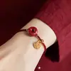 Pulsera de Cuerda Roja Tejida a Mano con Hebilla Ping An de Cinabrio Marca Fu Estilo Étnico Pulsera Roja de Cuerda para el Año de la Vida Pulsera Regalo para Estudiantes