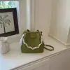 Bolso tipo cubo de alta apariencia 2026 Verano Nuevo de Moda Bolso Cruzado de Cadena Nicho Estilo Relajado Bolso de Mano de Color Sólido