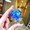 Chaveiro Pirulito Areia Movediça Luminoso Infundido com Óleo Pingente Fofo para Mochila Chaveiro Presente de Parque de Diversões Brinquedo Infantil