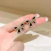Pendientes de Aro Negros Exquisitos y Compactos Transfronterizos Europeos y Americanos, Femeninos, de Alta Gama, Lujo Ligero, Pendientes y Accesorios para Orejas de Nicho