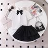 Conjunto de Verão Europeu e Americano Estilo College para Meninas, Camisa com Gola Lapela e Laço Preto, Saia Preta, Conjunto de Duas Peças