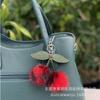 Nuevo llavero de cuero con bola de pelo bicolor Guangdong felpa colgante de cereza colgante exquisito accesorios para equipaje joyería de felpa