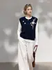 Chaleco de punto de alta gama estilo francés con bordado pesado para mujer, top sin mangas simple y versátil para otoño, para usar en capas