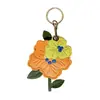 Portatarjetas de Acceso de Cuero Flor de Durazno Caliente Transfronterizo Localizador Estuche Protector Llavero Colgante de Regalo Hebilla de Anillo de Llave