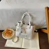 Mini bolsa de balde trançada vintage com decoração de laço de renda de pérolas, versátil e pode ser usada como bolsa transversal