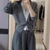 Nuevo cárdigan de punto de lana pura para mujer 2026, un look de dos piezas para otoño e invierno, con diseño de cuello en V y colores contrastantes para un look elegante y con estilo.